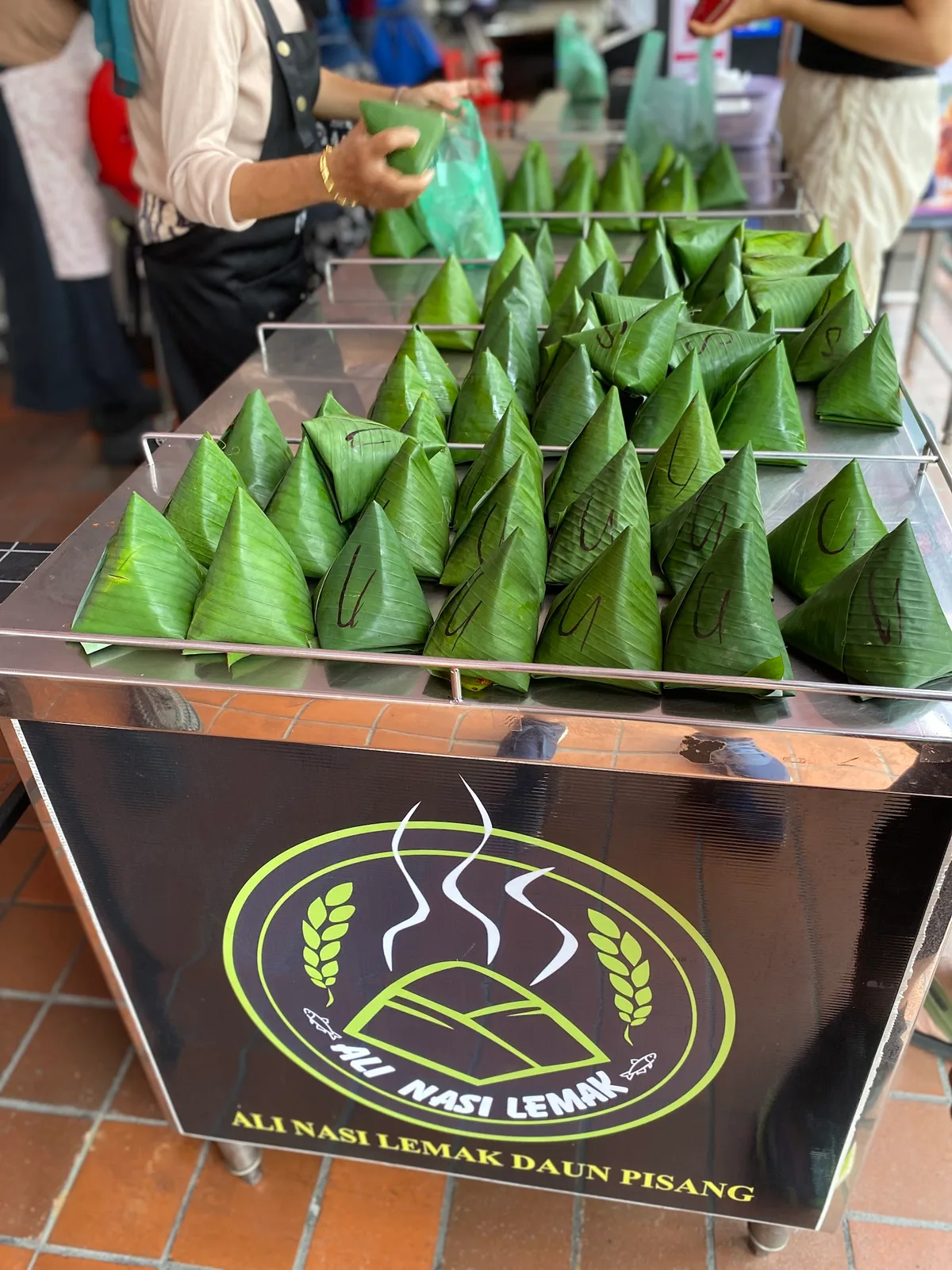 Ali Nasi Lemak Daun Pisang — signature dish