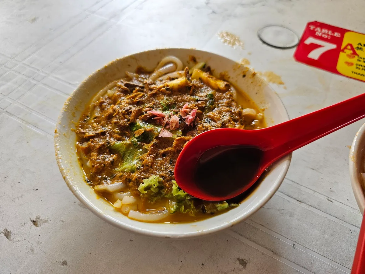 Kim Laksa — signature dish