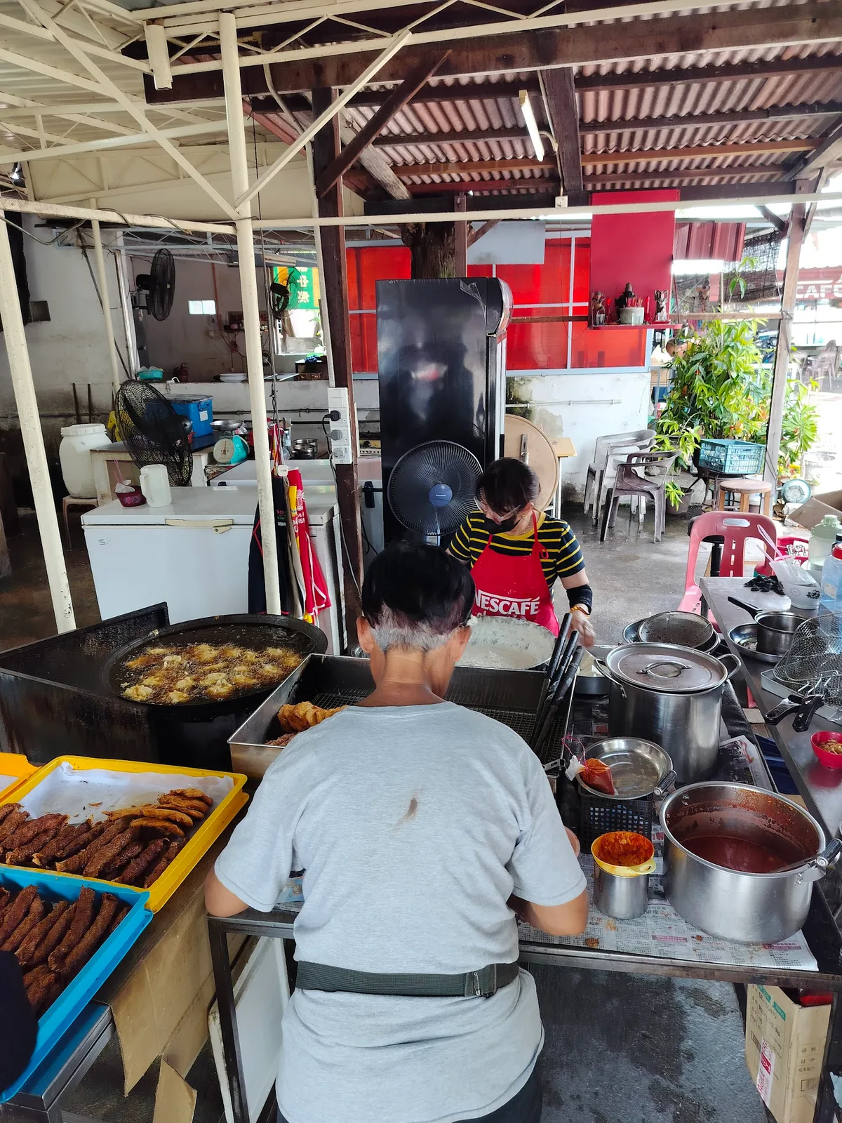 Tan Jetty Prawn Fritters & Loh Bak — signature dish