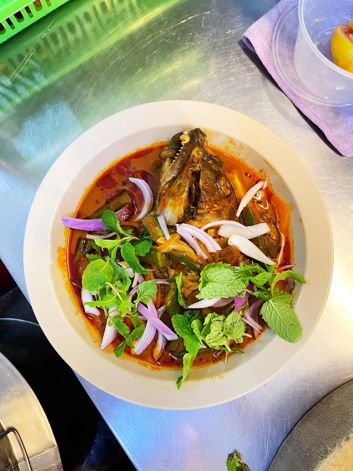 The Myth Curry Fish Head — signature dish