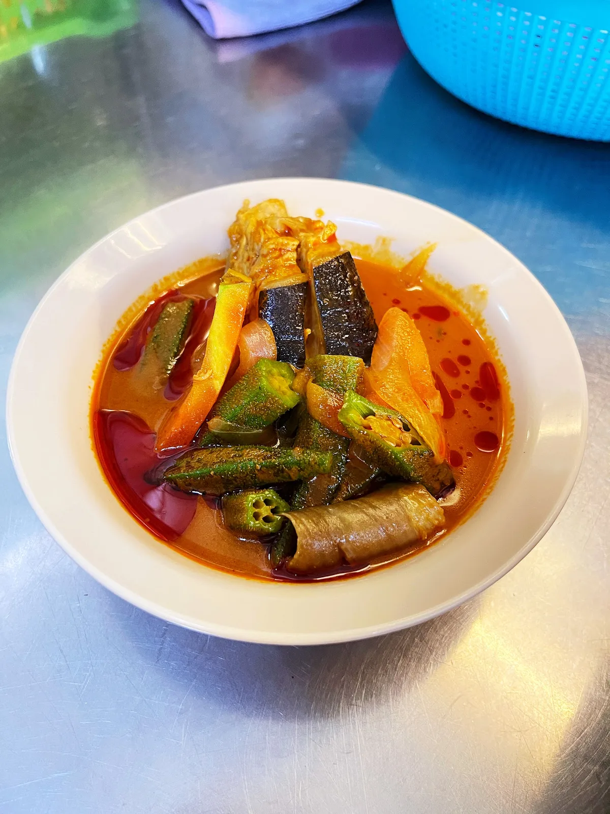 The Myth Curry Fish Head — signature dish