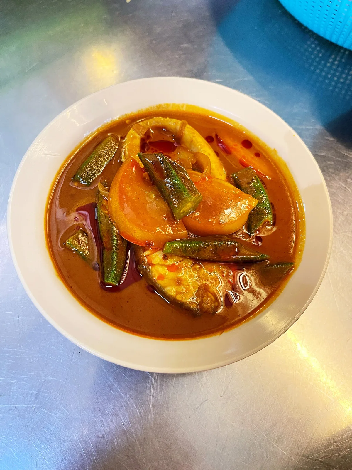 The Myth Curry Fish Head — signature dish
