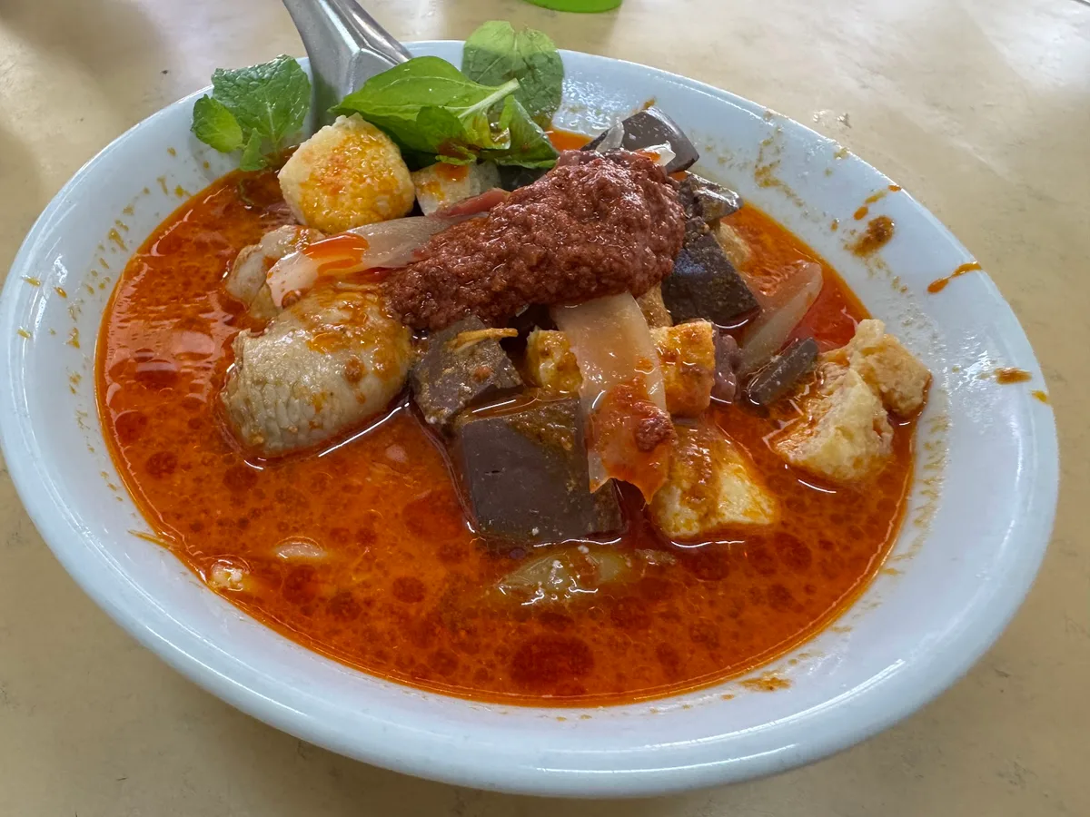 Tua Pui Curry Mee — signature dish