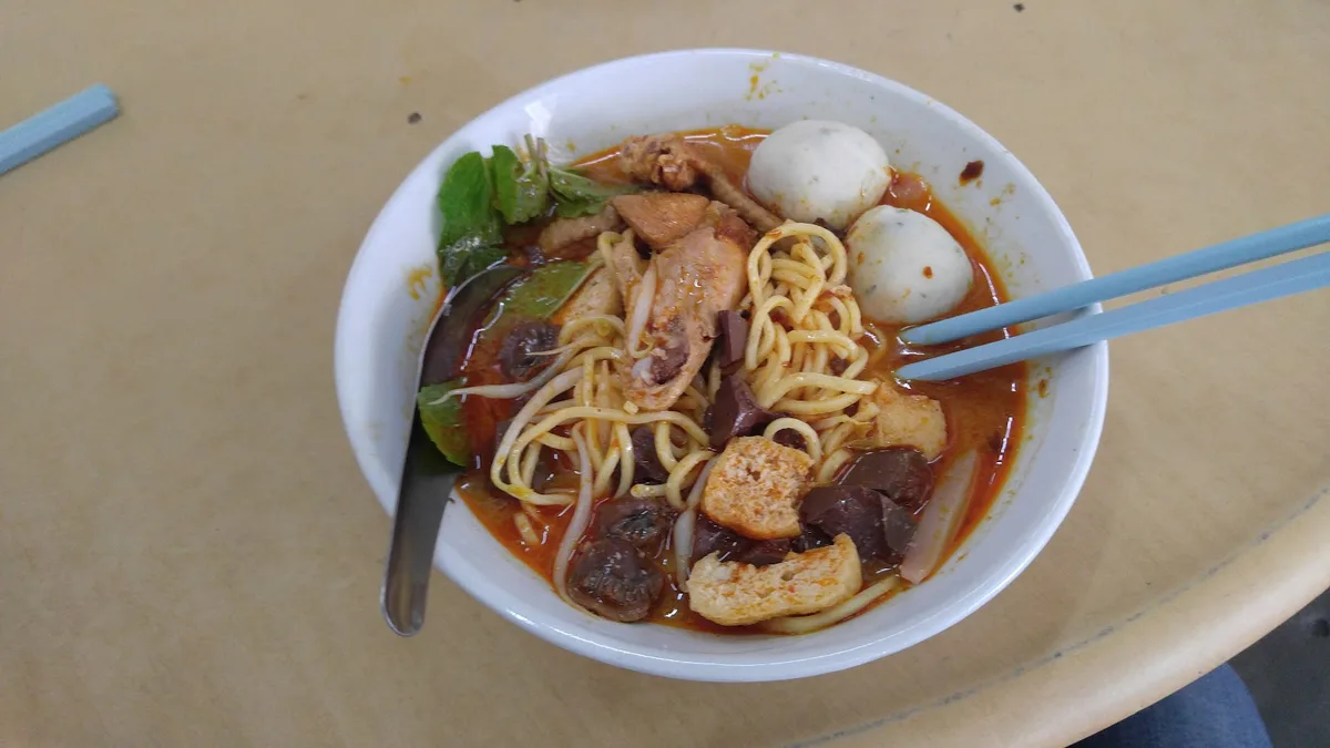 Tua Pui Curry Mee — signature dish